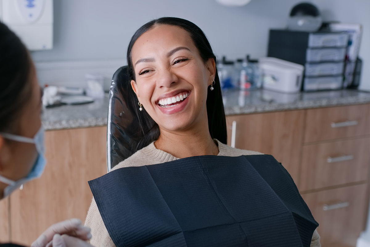 Woman smiling after a dental checkup