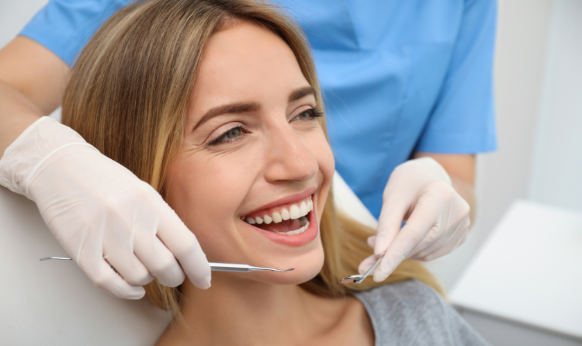 Patient smiling during a cosmetic dentistry visit