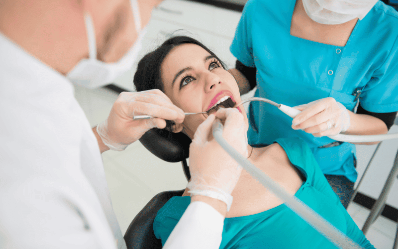 Patient receiving a routine dental examination