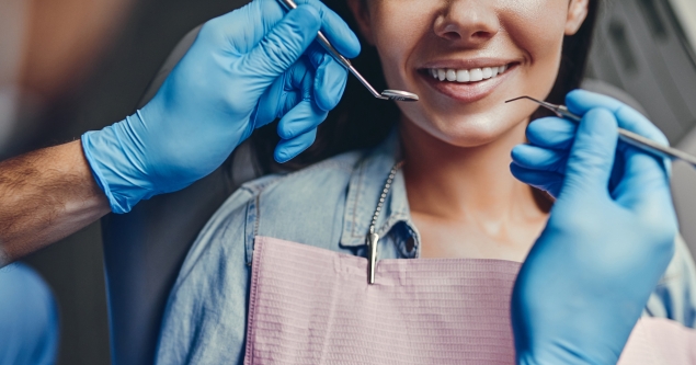 Patient receiving a post Halloween dental cleaning