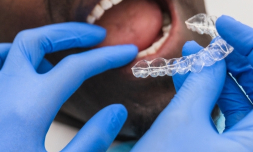 Teen patient receiving Invisalign treatment consultation