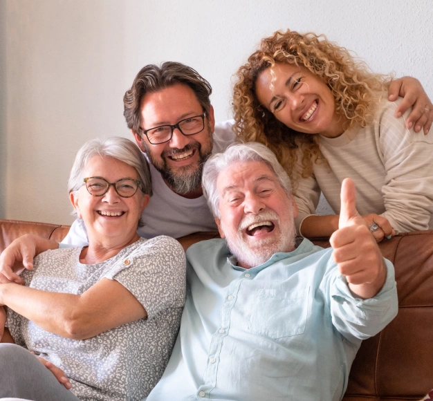 Happy family smiling together at home