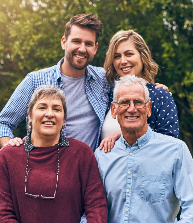 Multi generational family posing for a photo