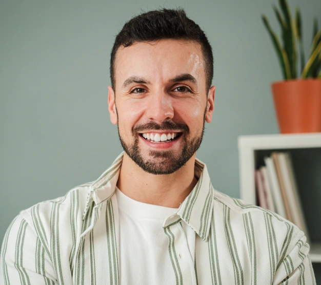 Man smiling after a professional dental cleaning
