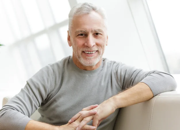 Smiling older man with gray hair