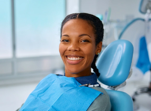 Woman smiling during dental checkup