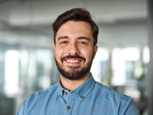 Man smiling indoors