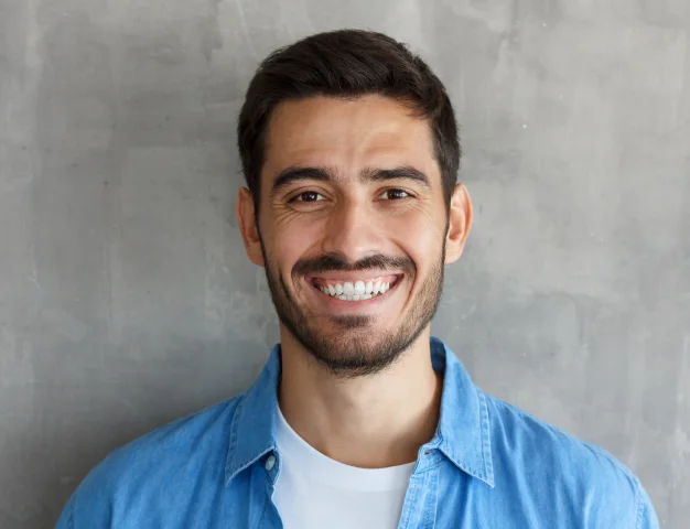 Smiling man with a healthy white smile